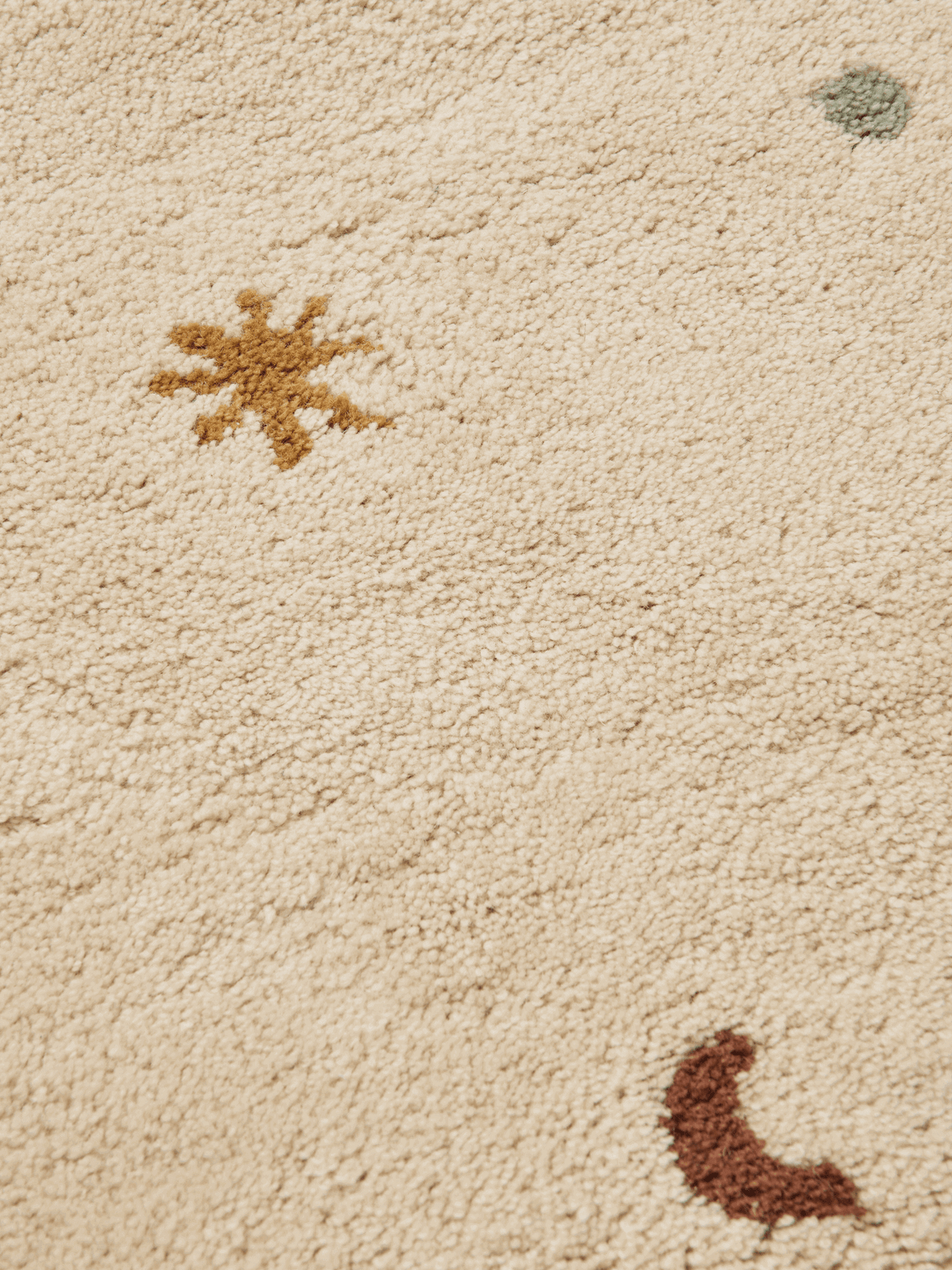 Overhead view of the Skye tufted rug in parchment