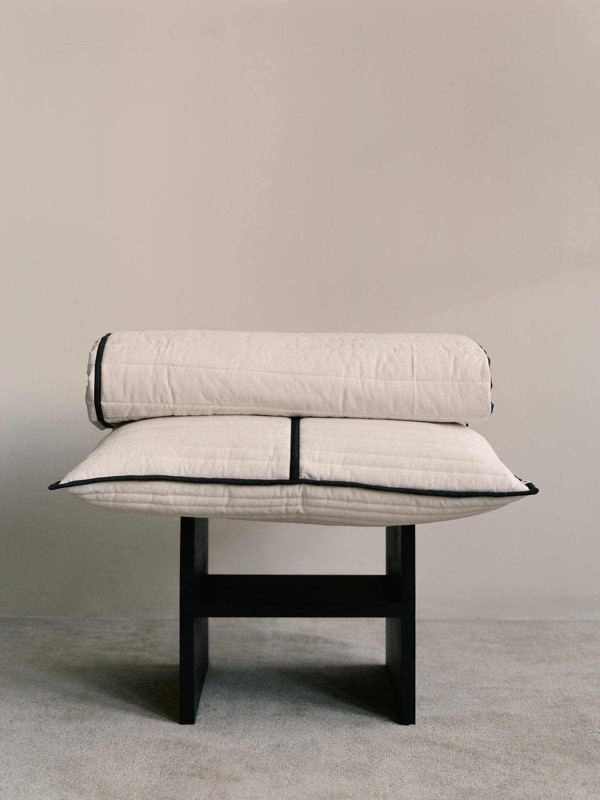 Vari quilted bedspread draped over a bed