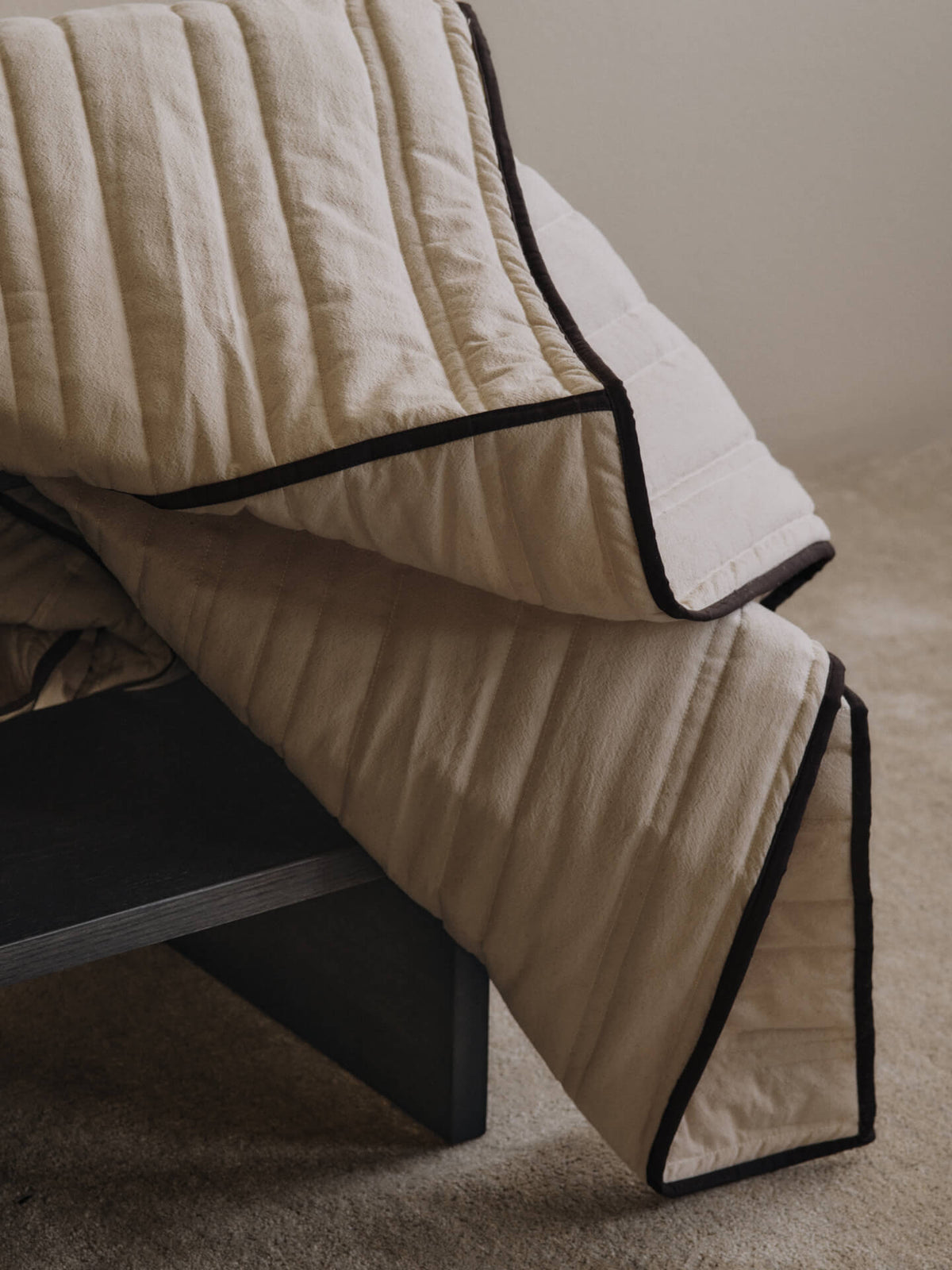 Detail of the Vari bedspread's quilted organic cotton texture