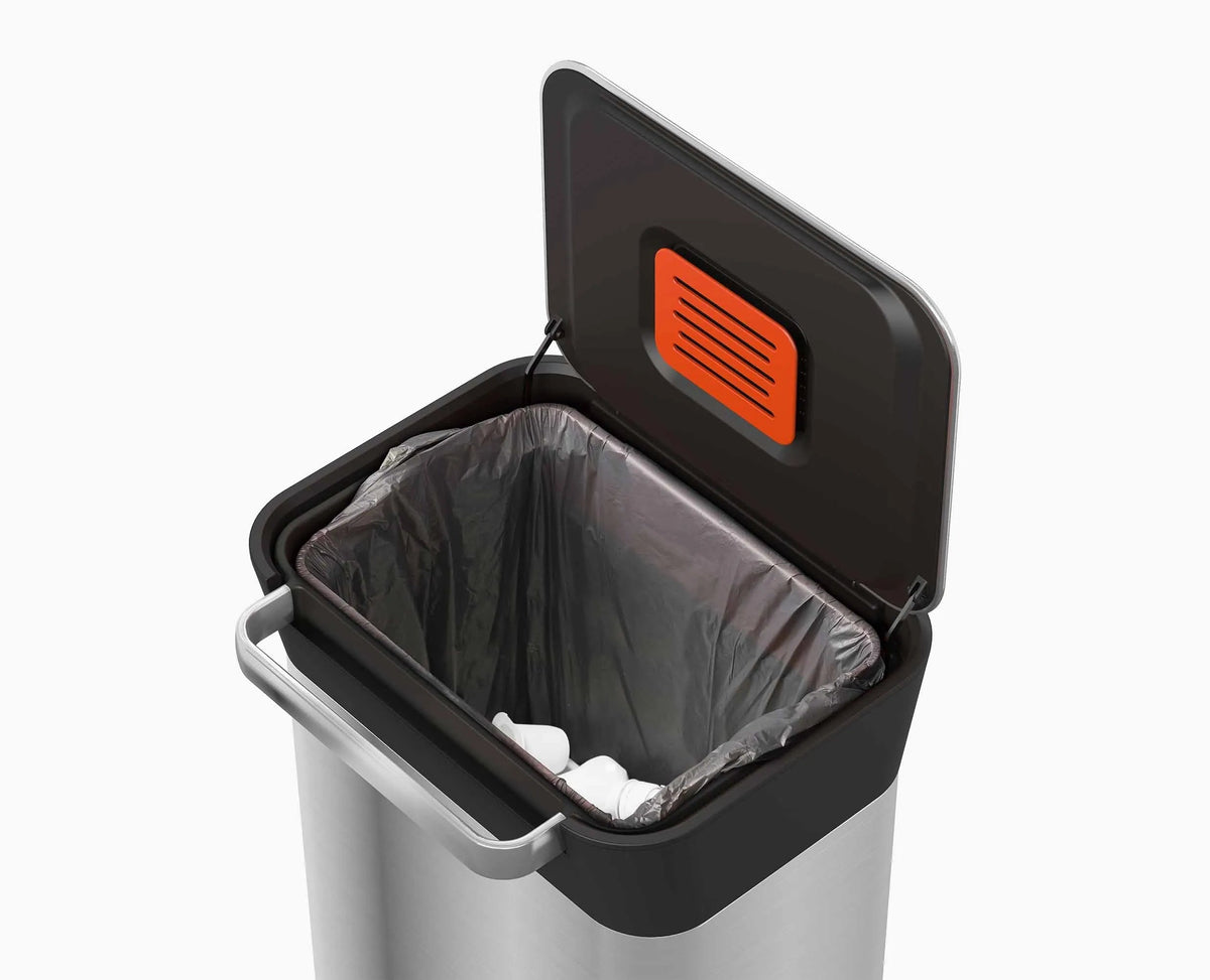 Titan bin with lid open showing compacted waste