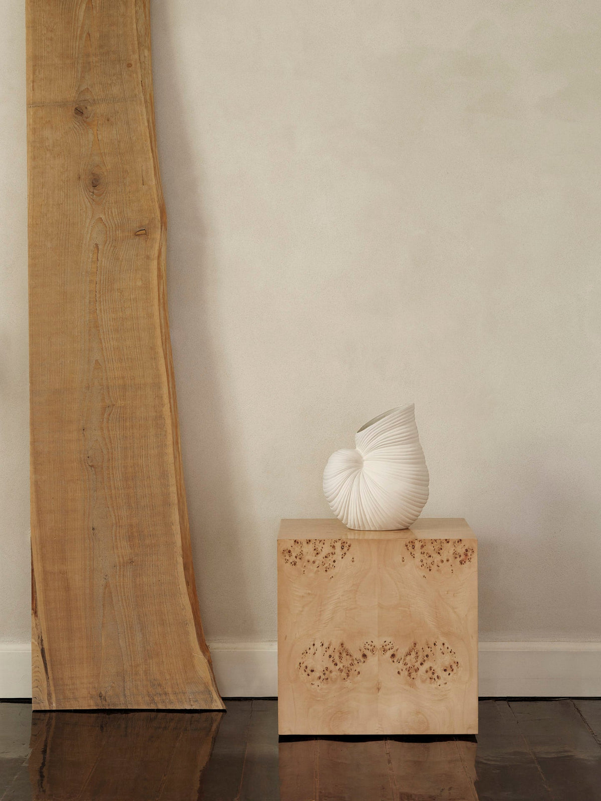 ferm LIVING Shell Vase on a wooden table