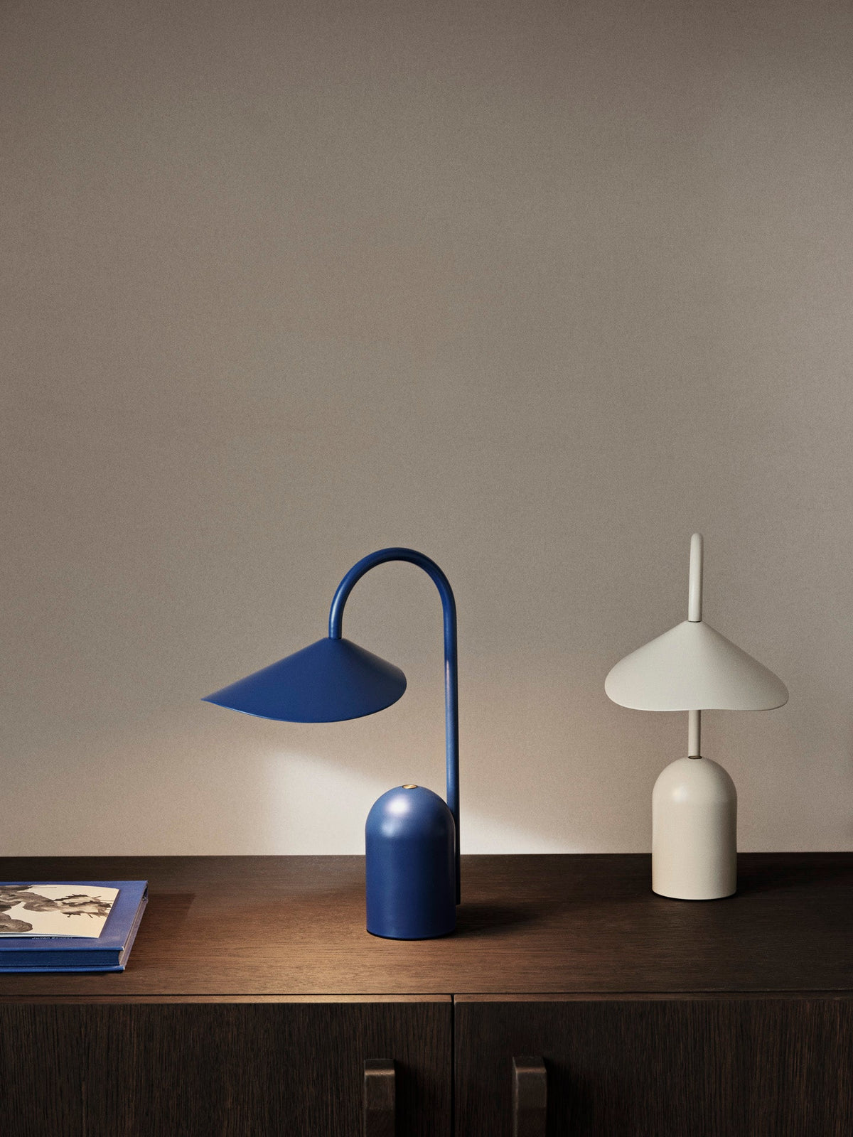 Arum lamp in cashmere lighting a shelf arrangement