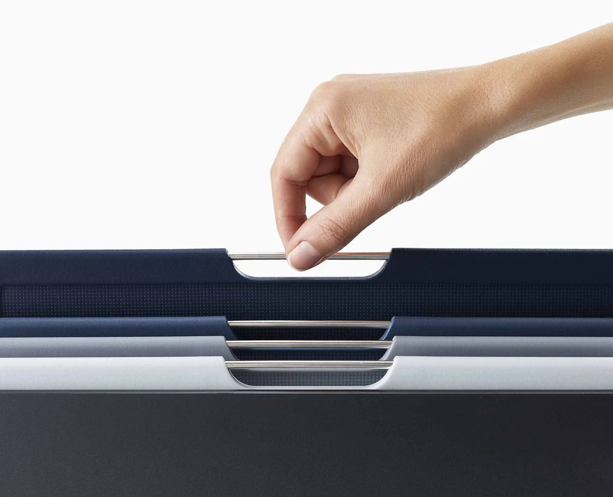 Close-up of stainless-steel bar and colour-coded tab