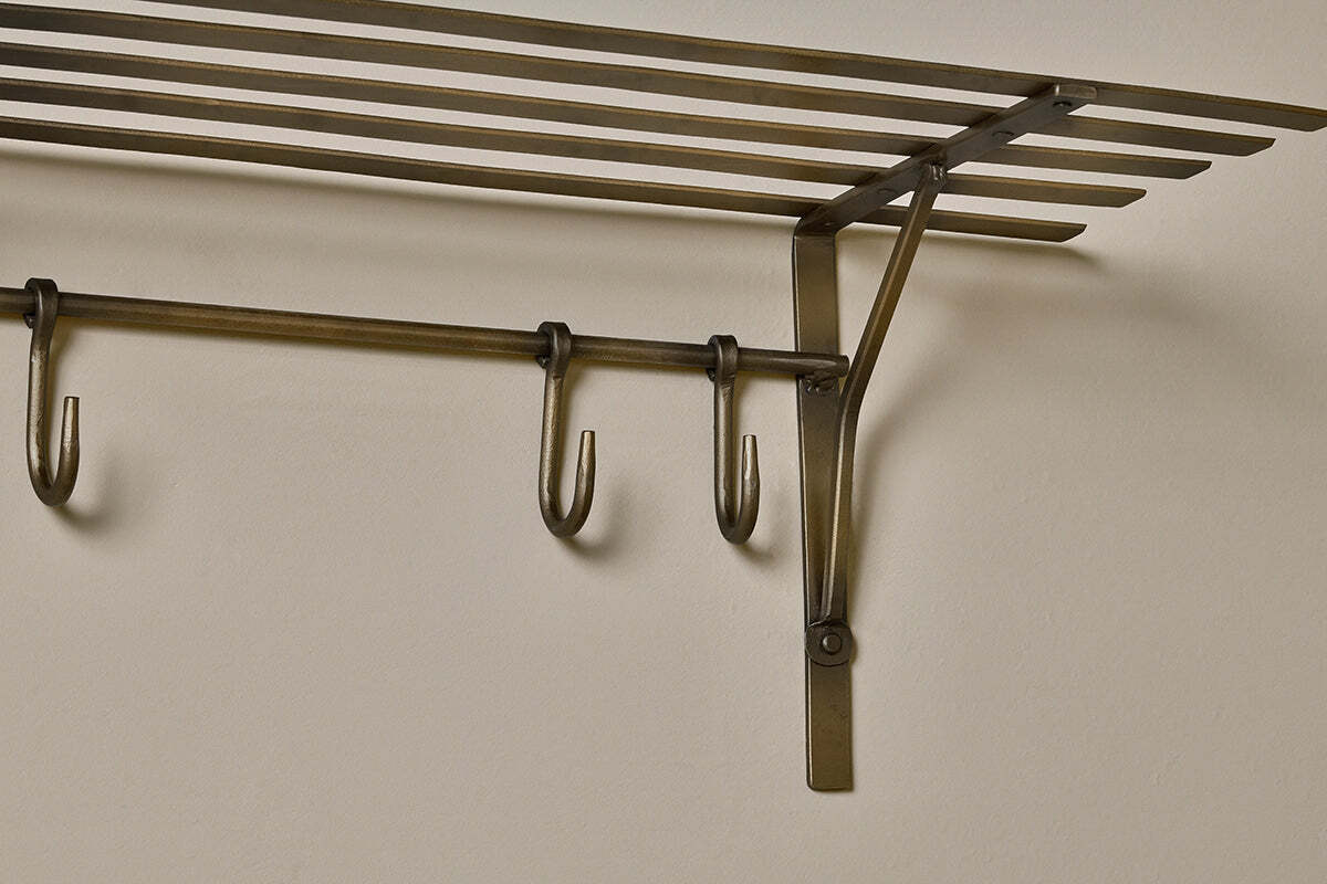 Basti iron storage shelf styled in a hallway