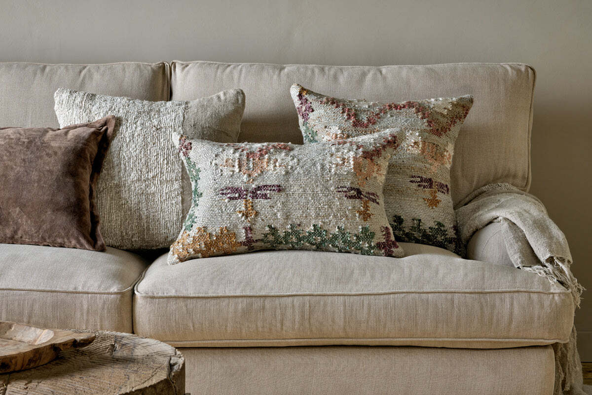 Nkuku Dantri jute and cotton cushion cover in soft grey with floral pattern