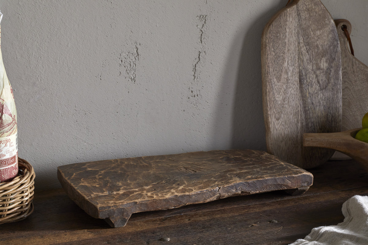 Kaveeta serving board styled with food on a table
