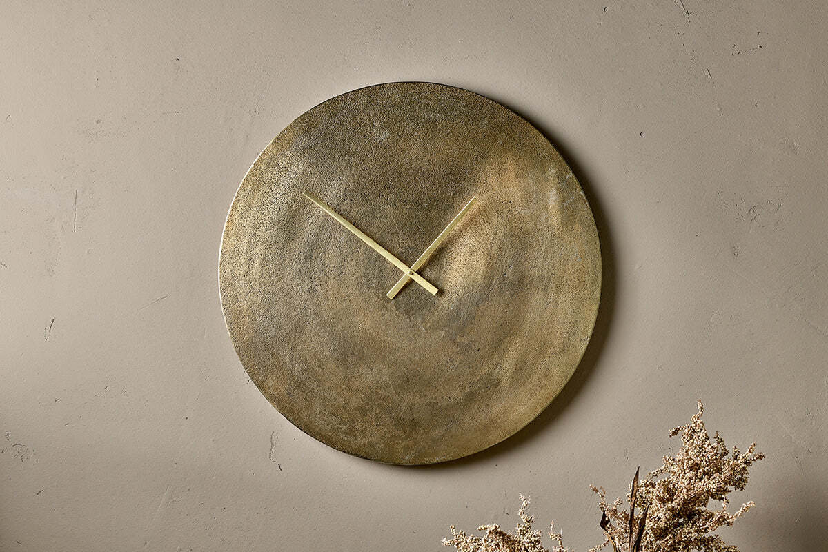 Nkuku Okota large wall clock in antique brass