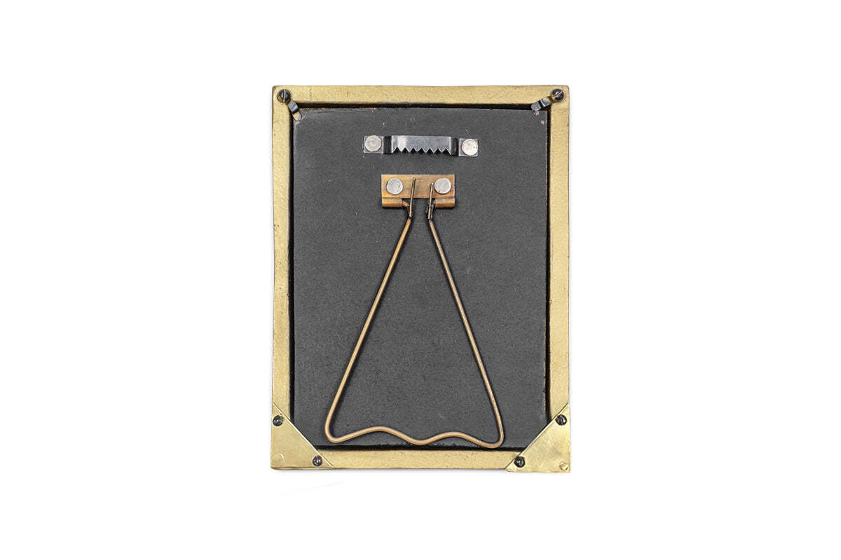 Pambani frame displayed standing on a shelf