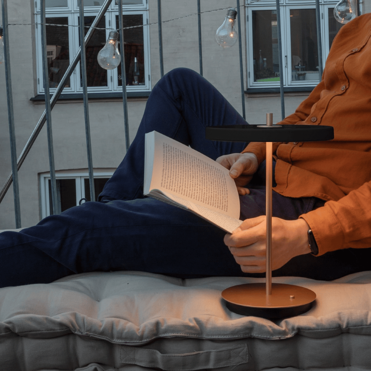 Asteria Move portable lamp providing soft evening light