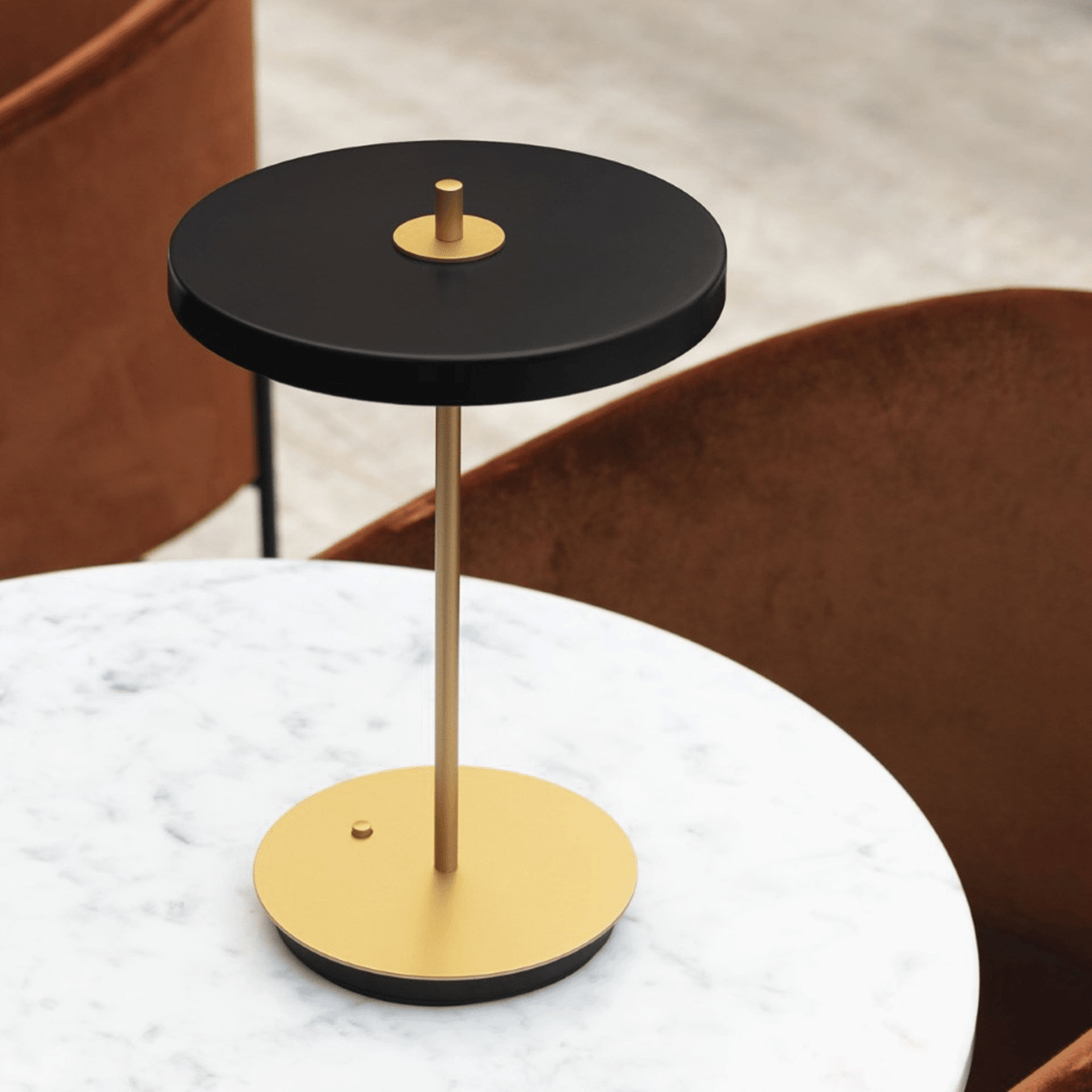 Asteria Move in black styled on a dining table