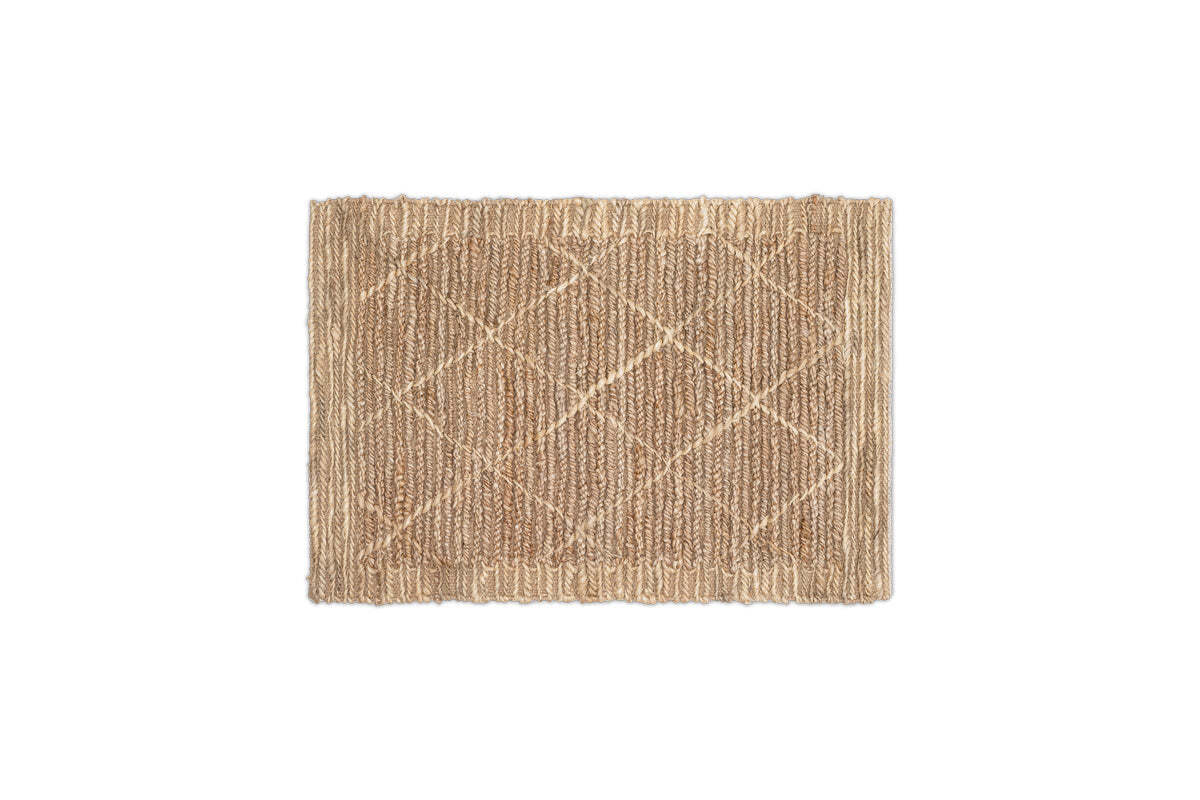 Close-up of the Vandi doormat's woven jute texture