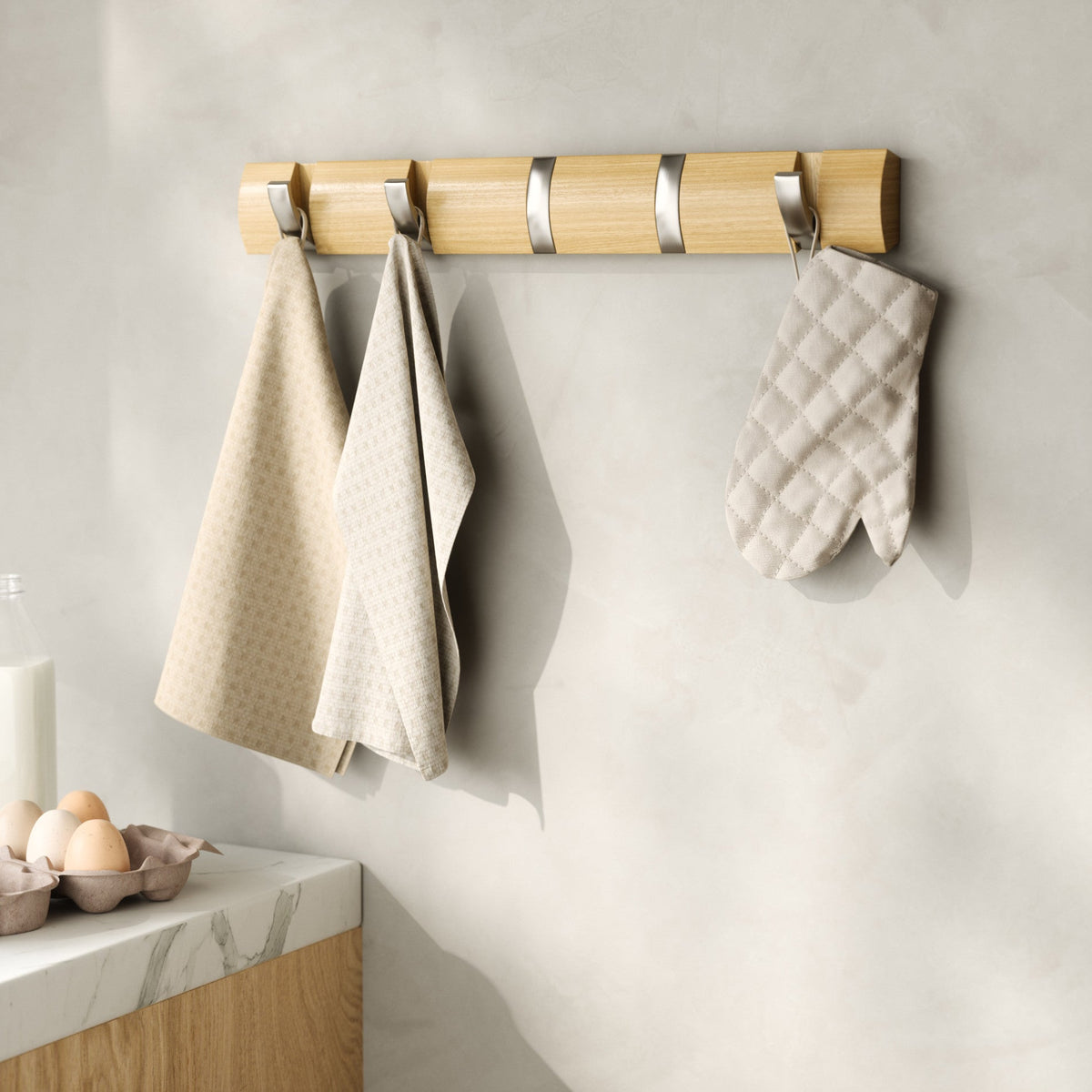 Flip 5 in natural holding coats and bags in a hallway
