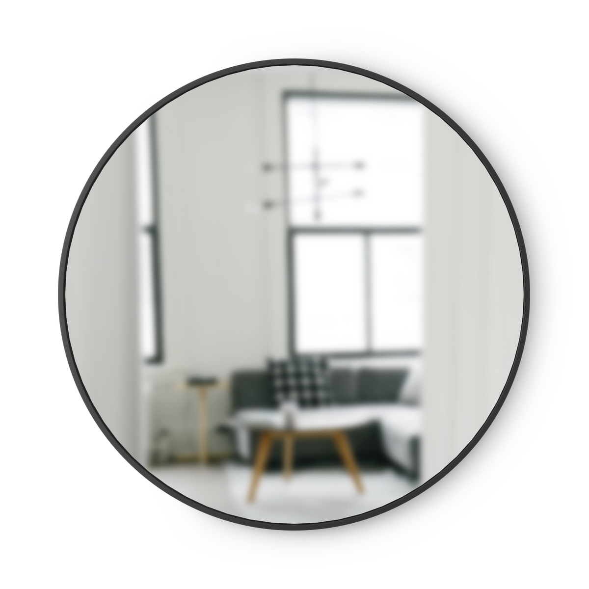 Umbra Hub round wall mirror with black rubber frame on white background