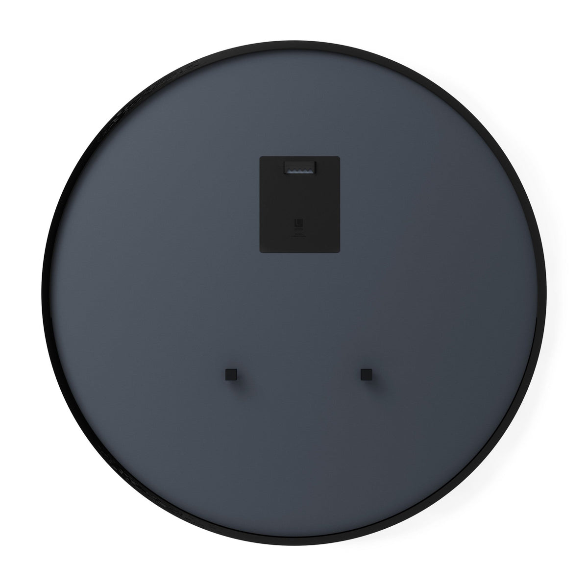 Umbra Hub mirror styled above a sideboard